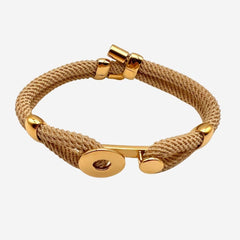 bracelet cordon trassé dune avec un fermoir rond en plaqué or alanne b